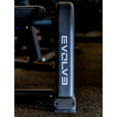 Machine d'élévation des mollets assis - Evolve Fitness UL-150 Ultra Series chargée en plaques