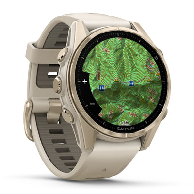 Garmin Fenix ​​​​8 Sapphire – 43 mm / AMOLED – Soft Gold mit nebelgrauem/dunklem Sandstein-Silikonarmband – Premium-Multisportuhr